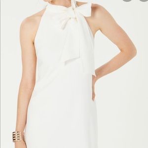 White high-neck bow dress